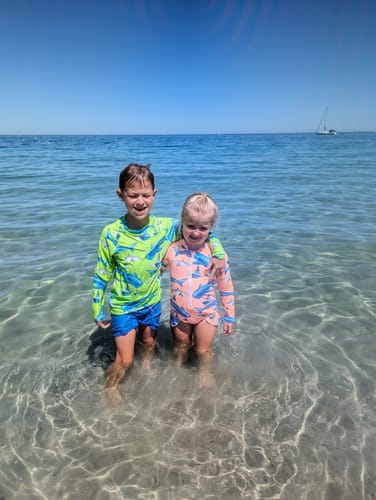Customer photo review of Fluro Green Sharks Kids' Rash Top