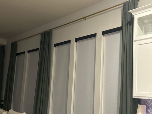 Customer photo review of SmartWings Motorized Light Filtering Roller Shades 70% Blackout Essential