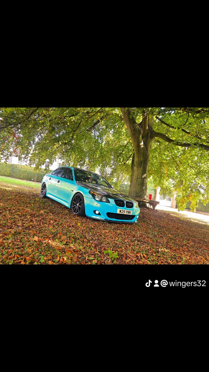 Customer photo review of Candy Metallic Neon Ice Blue Vinyl Wrap