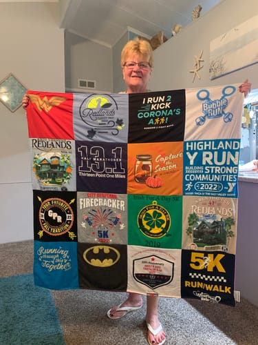 T-shirt quilt with running, community events themes by Mary from CA
