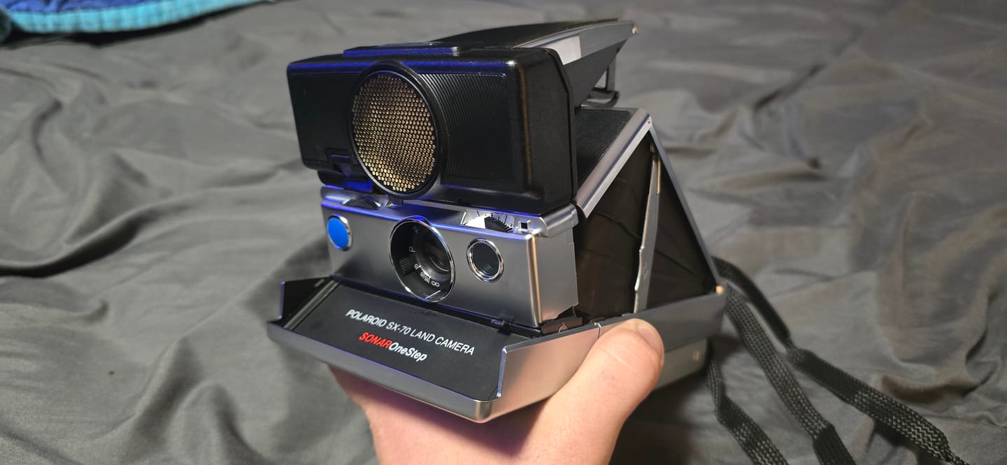 Customer photo review of Polaroid Sonar Autofocus SX-70 to 600 Film Conversion with Repair Service