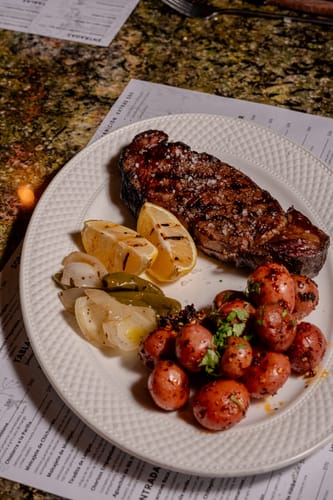 Reseña con foto de un cliente sobre New York Steak Dry Aged
