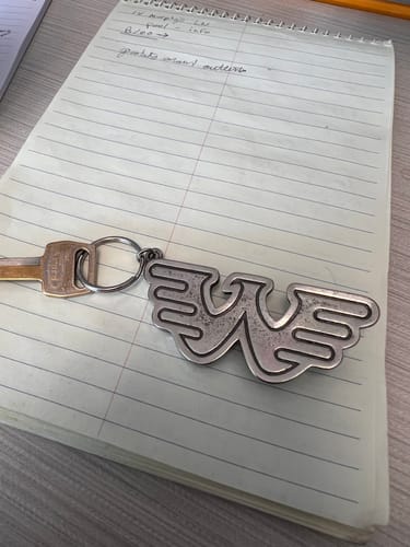 Customer photo review of Waylon Jennings Flying W Keychain and Bottle Opener