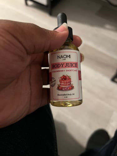 Customer photo review of BOGO Naomi Body Juice Oil