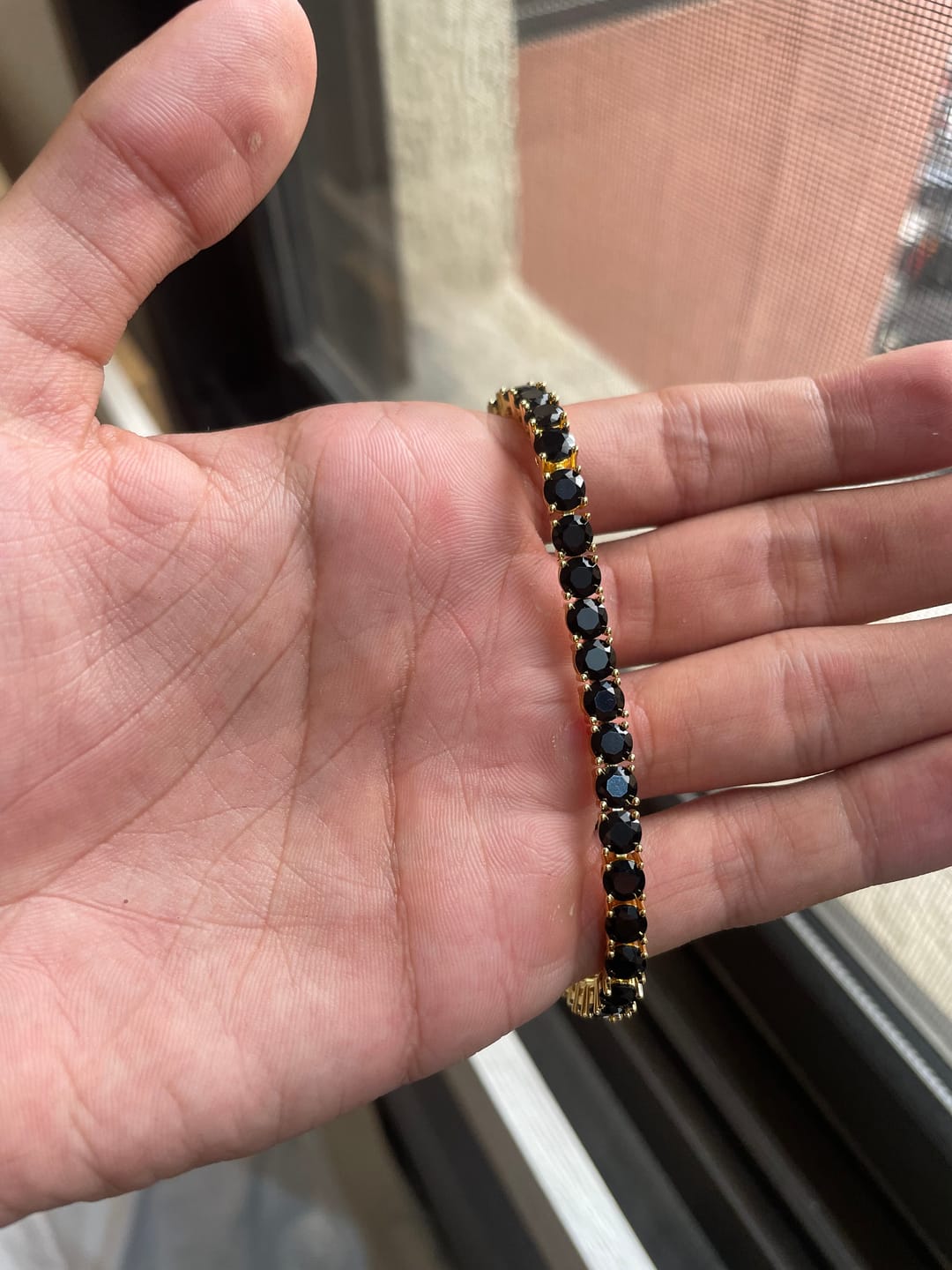 Customer photo review of TENNIS ZIRCON BRACELET - BLACK/GOLD
