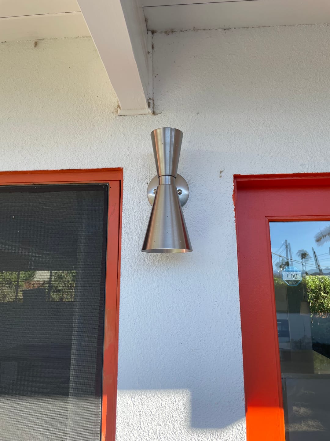 Customer photo review of 2-Light Metal Starry Hourglass Wall Sconce