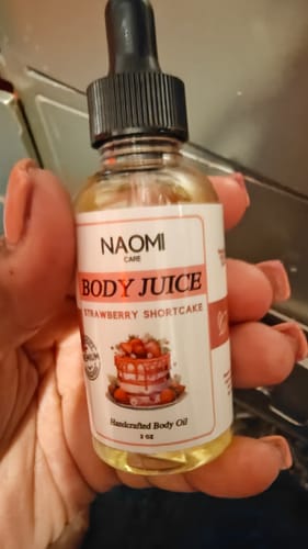 Customer photo review of BOGO Naomi Body Juice Oil