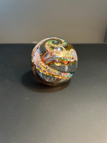 Customer photo review of Vibrant Memorial Helix Orb with Cremains