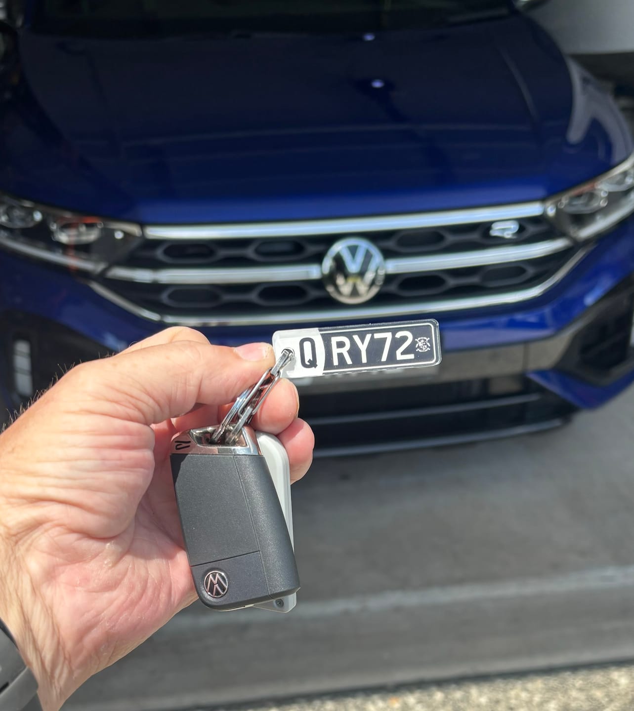 Customer photo review of PG Mini Custom Keychain