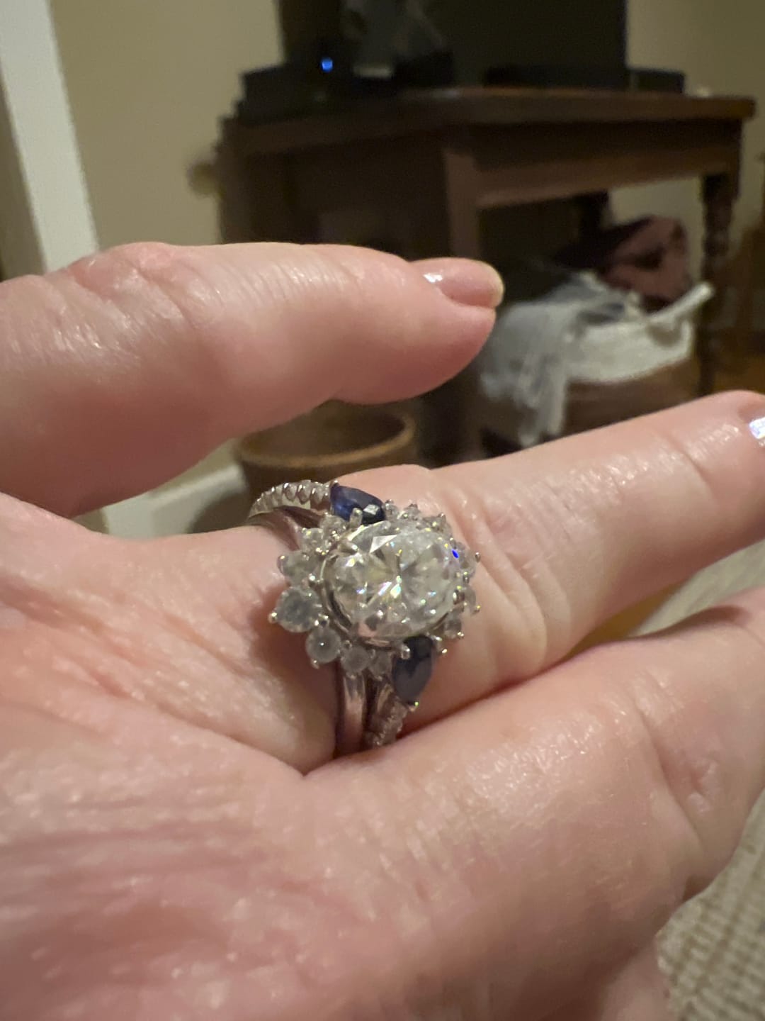 Customer photo review of Halo Oval Moissanite Pear Sapphire Sidestone Pave Engagement Ring