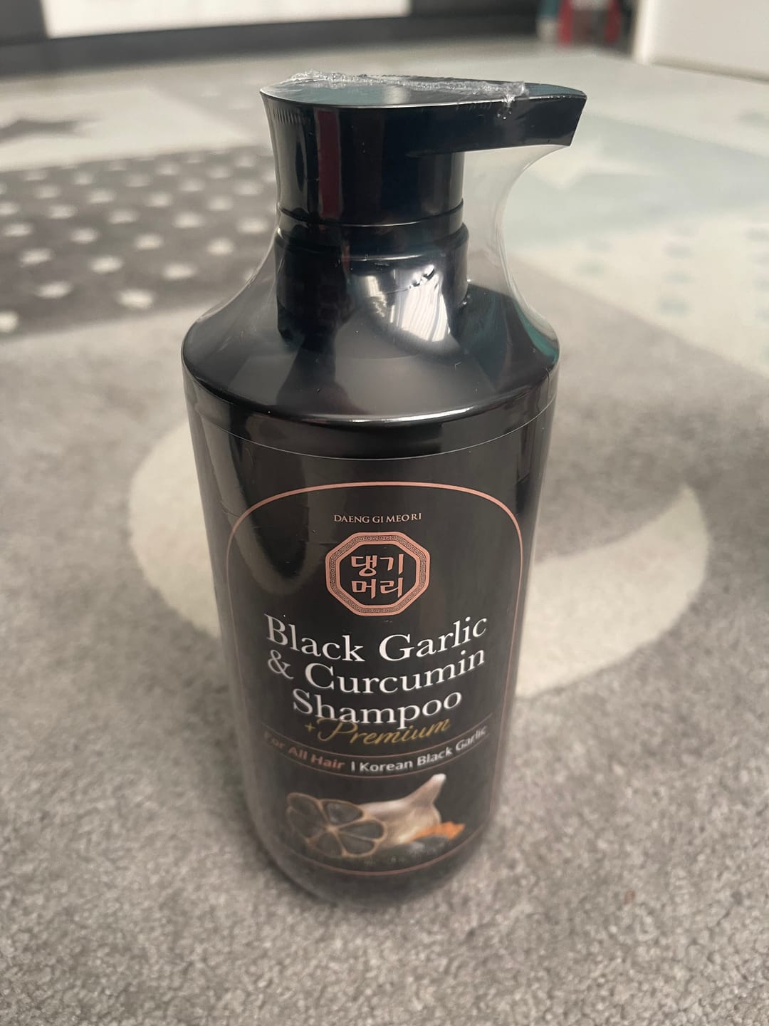 Customer photo review of Премиум анти-ейдж шампоан против косопад с Черен чесън и куркумин Doori Black Garlic and Curcumin Shampoo