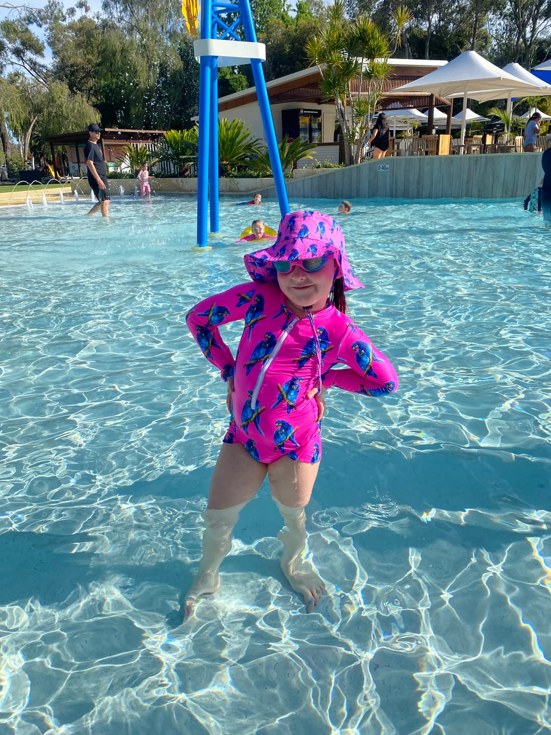 Customer photo review of Fluro Macaw Girls Long Sleeve Zip Swimmers