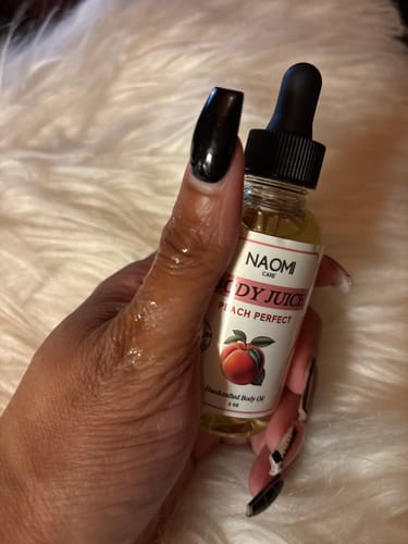 Customer photo review of BOGO Naomi Body Juice Oil