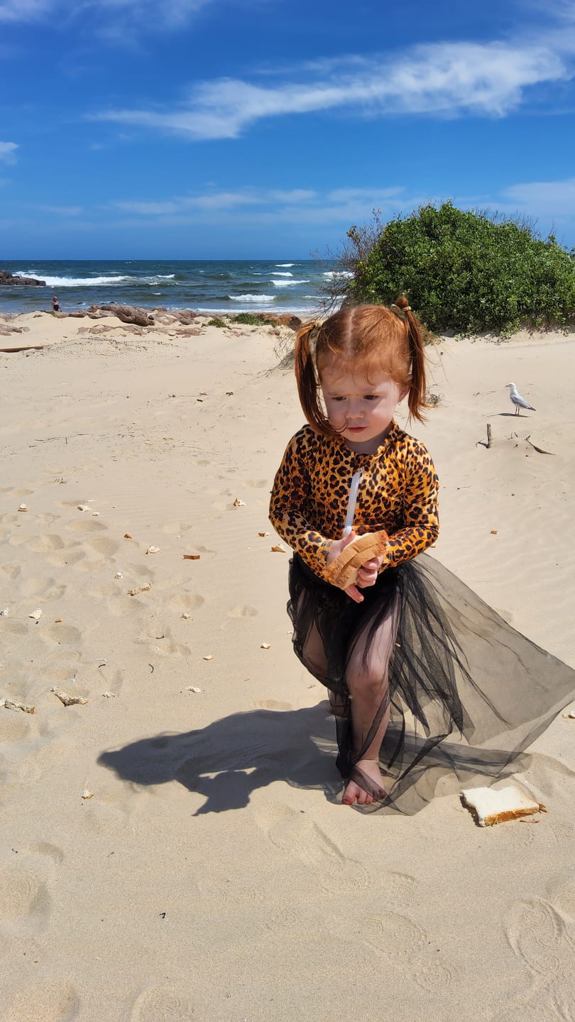 Customer photo review of Leopard Print Long Sleeve Girls Zip Swimmers