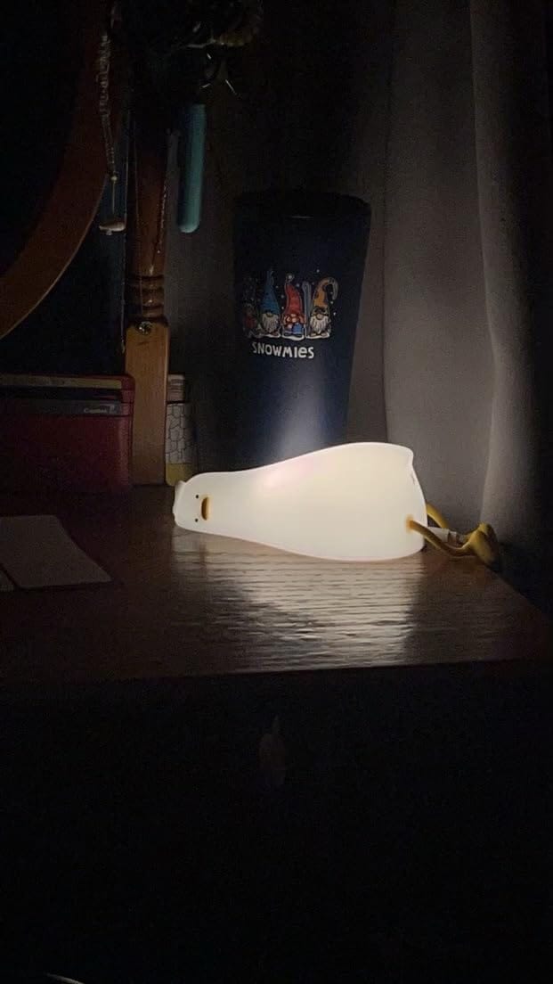Customer photo review of Huggwaii Squishy Silicone Lazy Duck LED Night Light - Perfect Gift for Kids and Girls