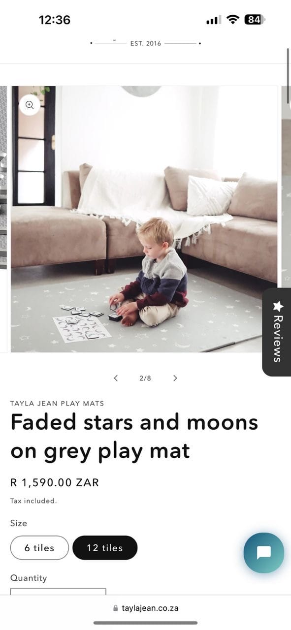 Customer photo review of Faded stars and moons on grey play mat