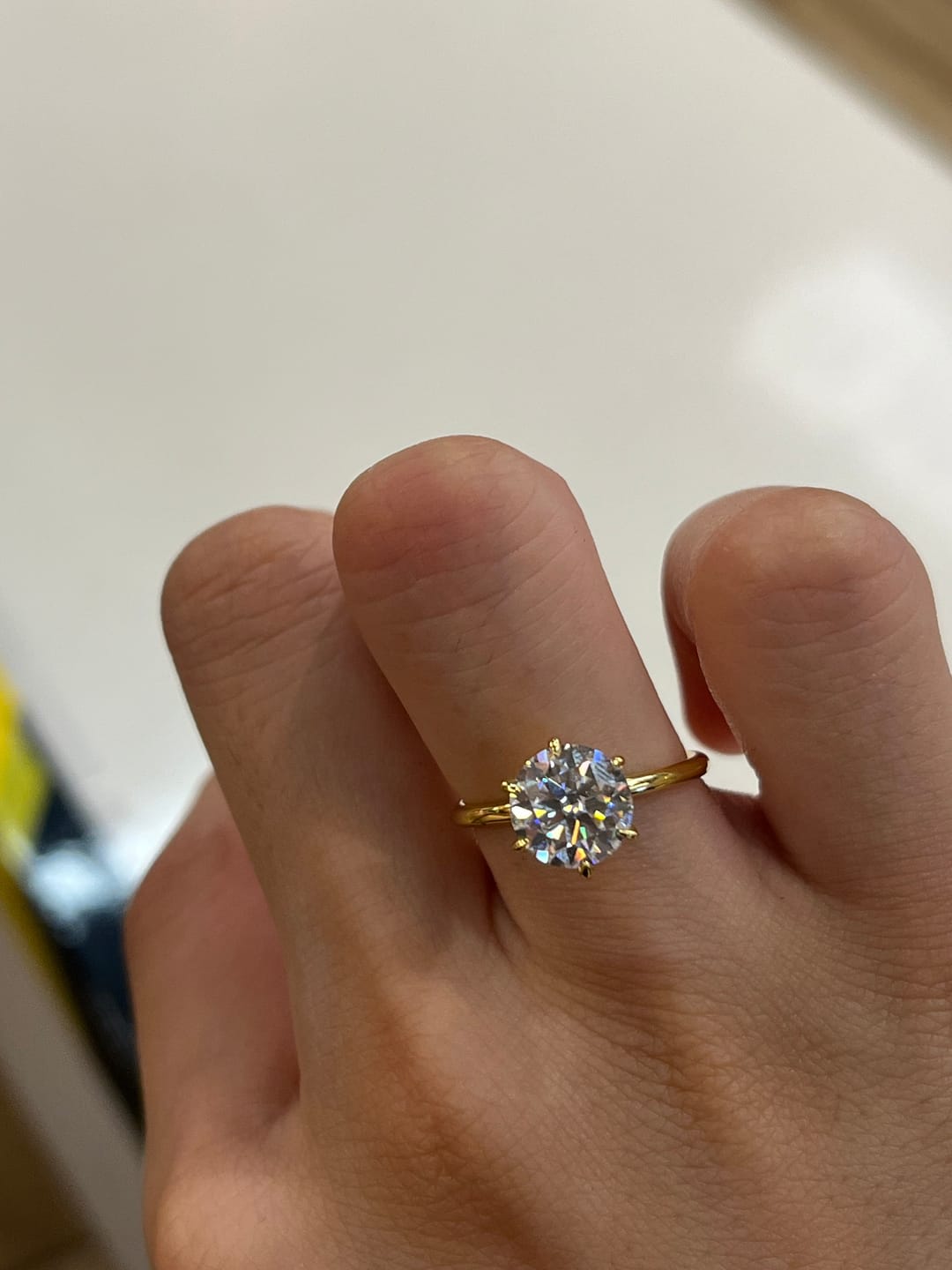 Customer photo review of S925 Moissanite/ Simulated Diamond 2.0 Carat Round Cut Solitaire Engagement Ring In Sterling Silver