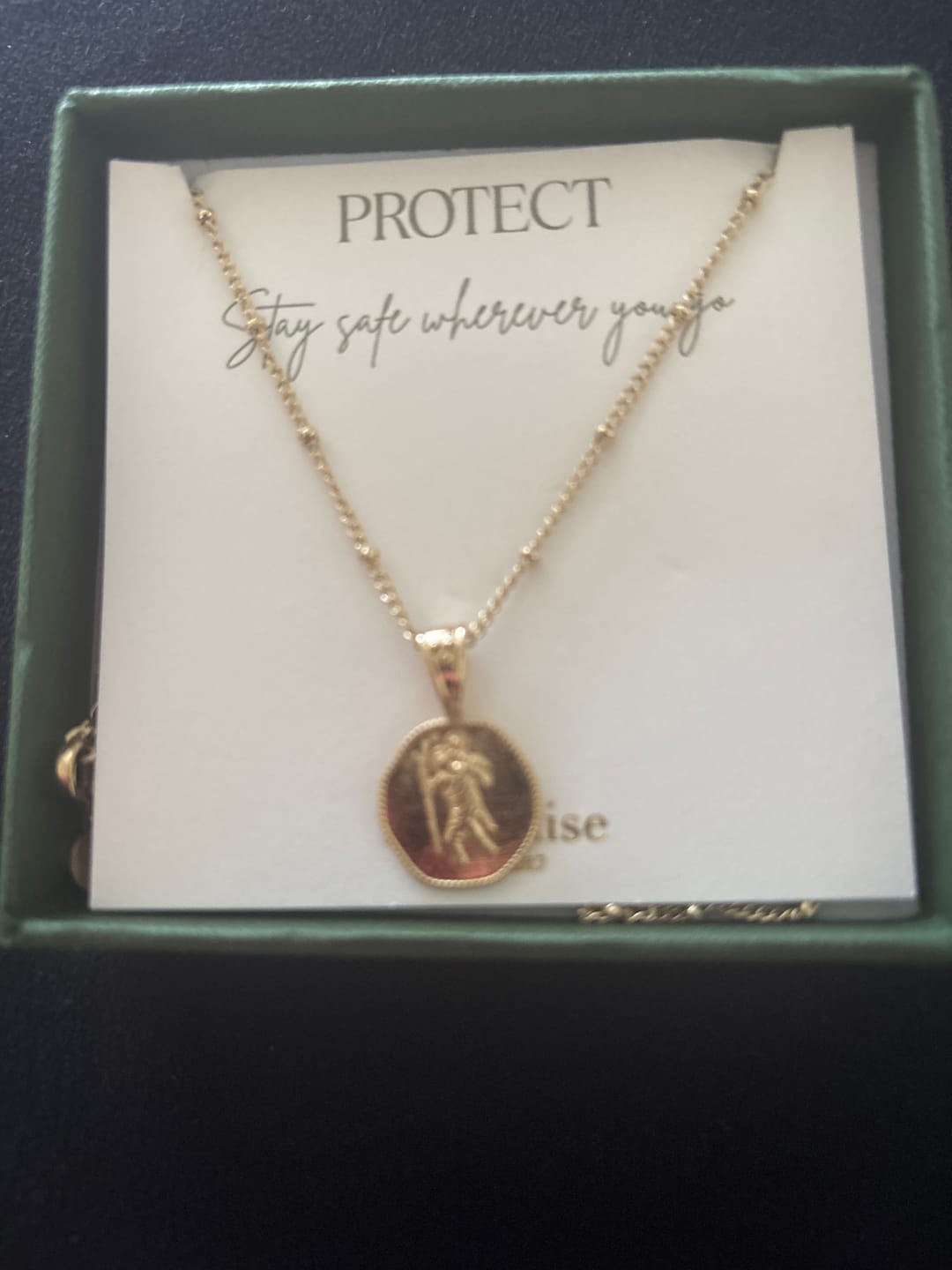 Customer photo review of St. Christopher Necklace - Stay Safe Wherever You Go