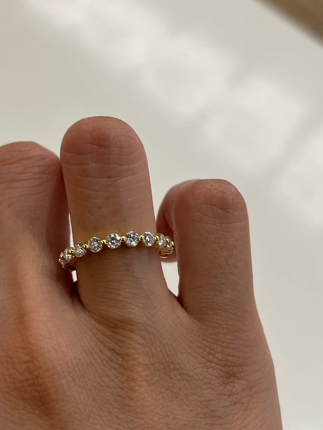 Customer photo review of S925 Moissanite Eternity 1.5 CT Round Cut Wedding Band Stackable Ring