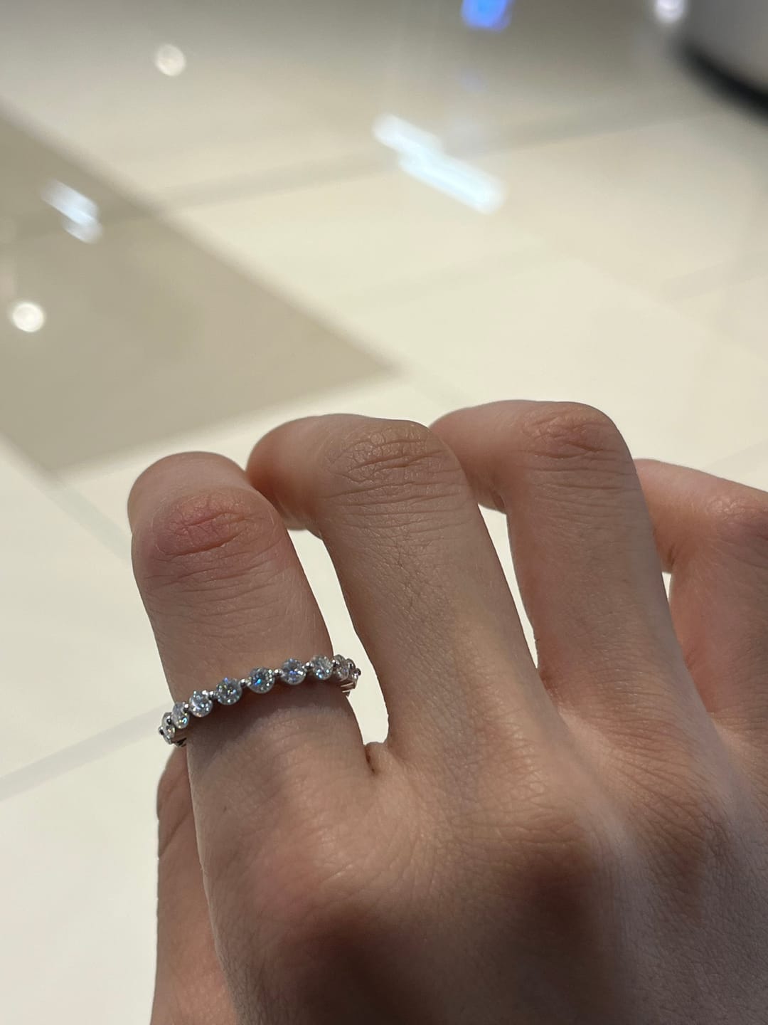 Customer photo review of S925 Moissanite Eternity 1.5 CT Round Cut Wedding Band Stackable Ring