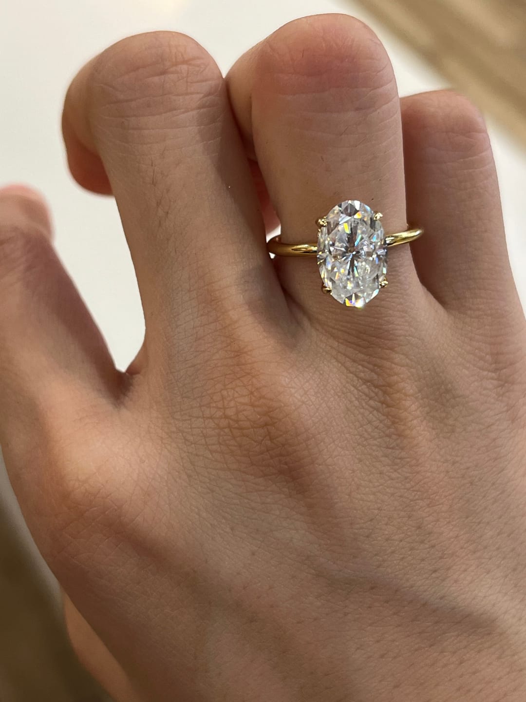 Customer photo review of S925 Moissanite 2.0~5.5 Carat Oval Cut Hidden Halo Engagement Ring For Everyday Wear