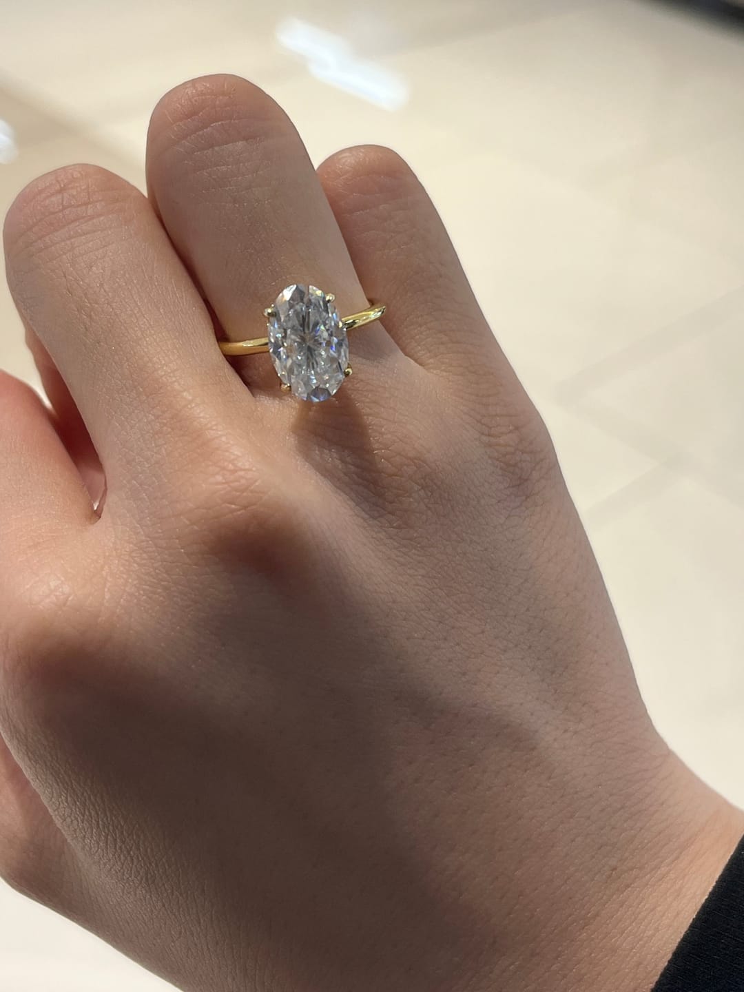 Customer photo review of S925 Moissanite 2.0~5.5 Carat Oval Cut Hidden Halo Engagement Ring For Everyday Wear