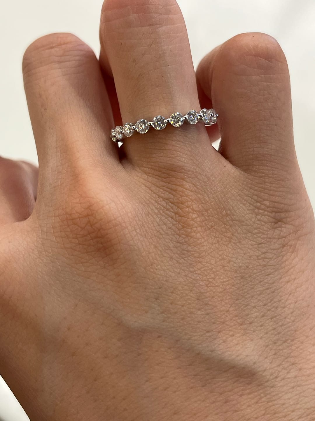 Customer photo review of S925 Moissanite Eternity 1.5 CT Round Cut Wedding Band Stackable Ring