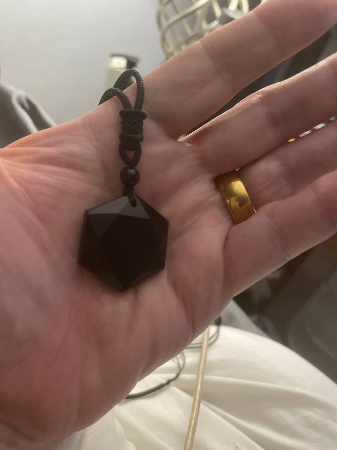Customer photo review of Obsidian Self Protection Necklace