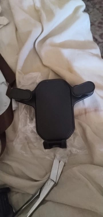 Customer photo review of Air Phone Holder - Soporte de Celular Para Vehículo