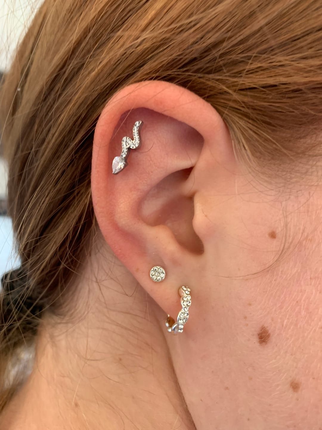 Customer photo review of Shine Snake Piercing | Titan