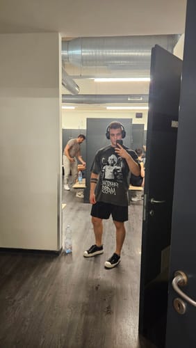 Customer photo review of washed t-shirt (physical mass)