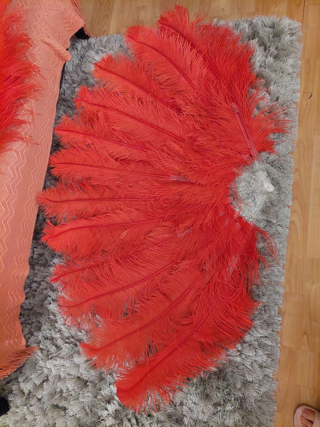 Customer photo review of Luscious red XL 2 layers Ostrich Feather Fan 34"x 60"