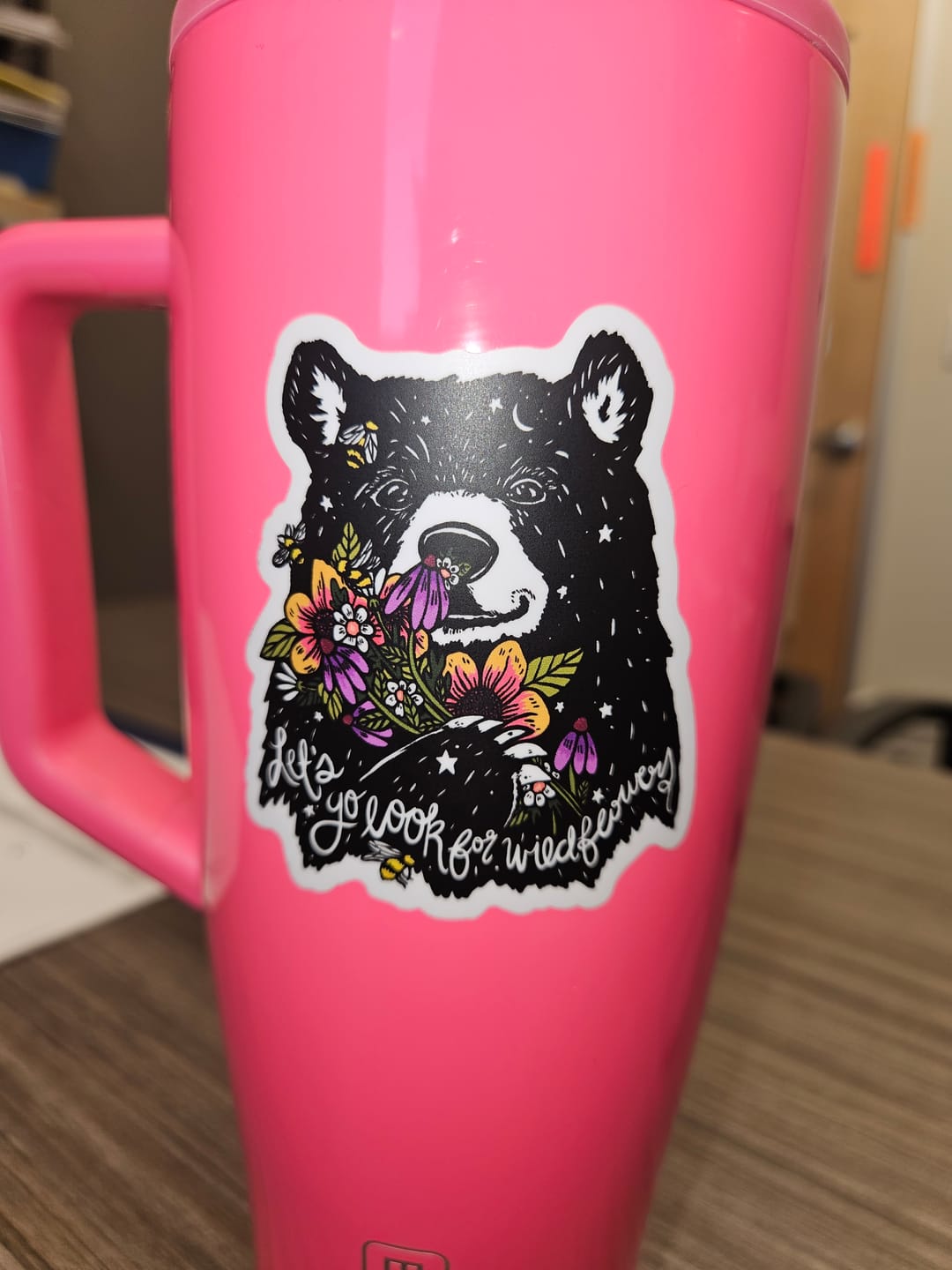 Customer photo review of "Let's go look for wildflowers" bear sticker