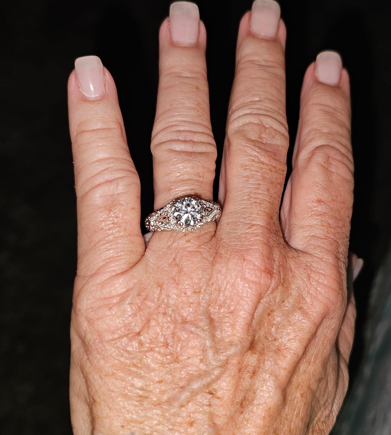 Customer photo review of Vintage Moissanite Pave Open Scroll Accents Engagement Ring