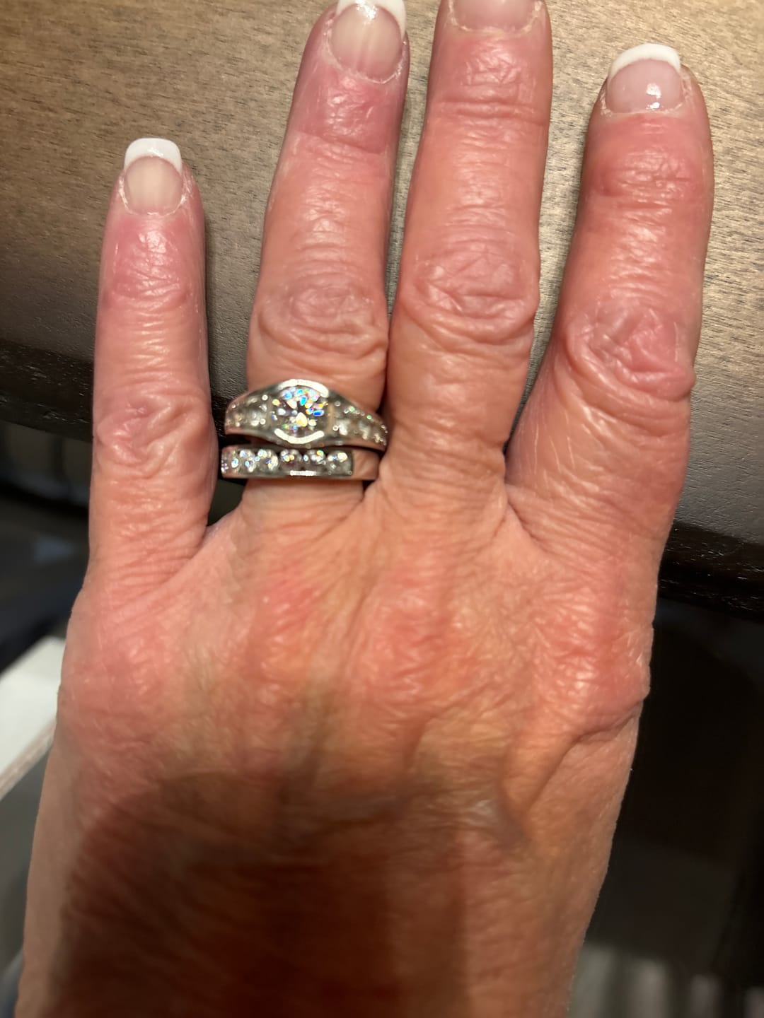 Customer photo review of Channel Set Moissanite Half Eternity Wedding Band Ring In Sterling Silver
