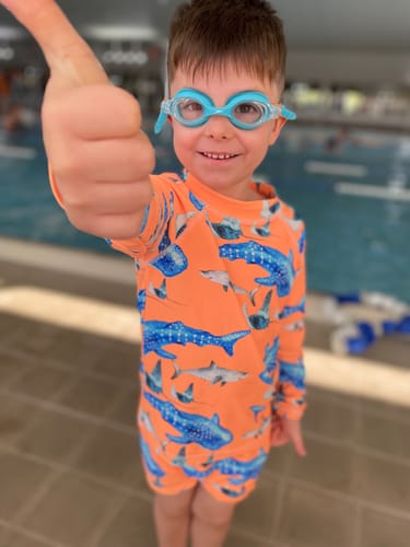 Customer photo review of Fluro Orange Sharks Swim Shorts