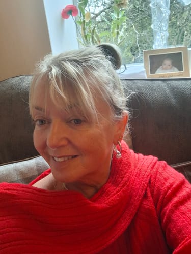 Customer photo review of Amore Heart Hoop Earrings