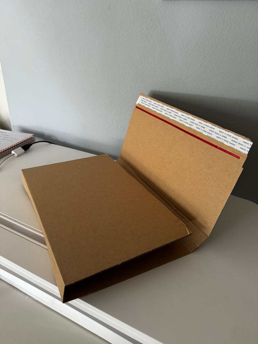 Customer photo review of Self Sealing Wrap Mailer A4 302 x 215 x 80mm Book Wrap R4