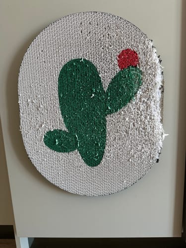 Customer photo review of Plant-Themed Corrugated Paper Cat Scratching Pad Cat Scratcher