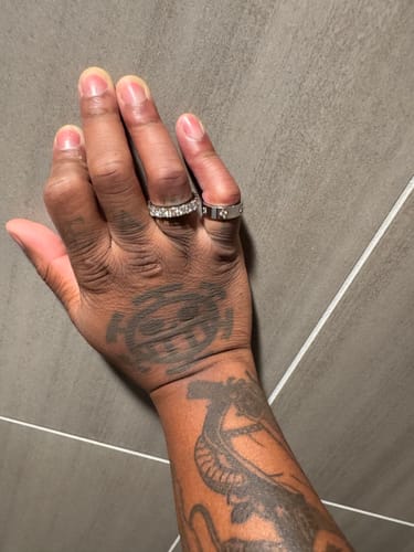 Customer photo review of 4mm VVS Certified Moissanite Eternity Ring