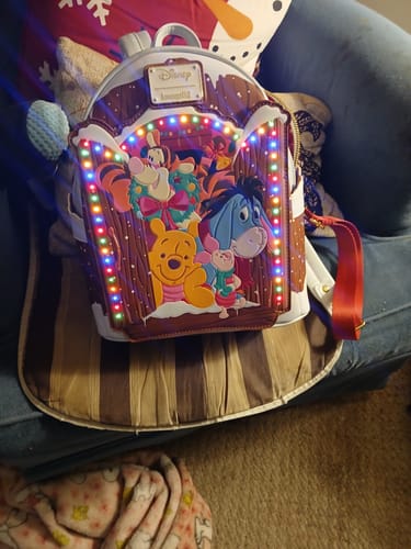 Customer photo review of Loungefly Disney Winnie The Pooh & Friends Christmas Greetings Light Up Mini Backpack