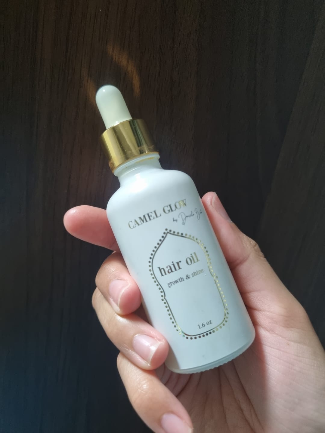 Customer photo review of Growth & Shine Hair Oil
