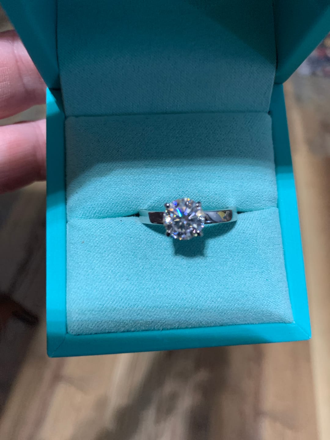 Customer photo review of Solitaire Moissanite Four Prong Flat Shank Engagement Ring