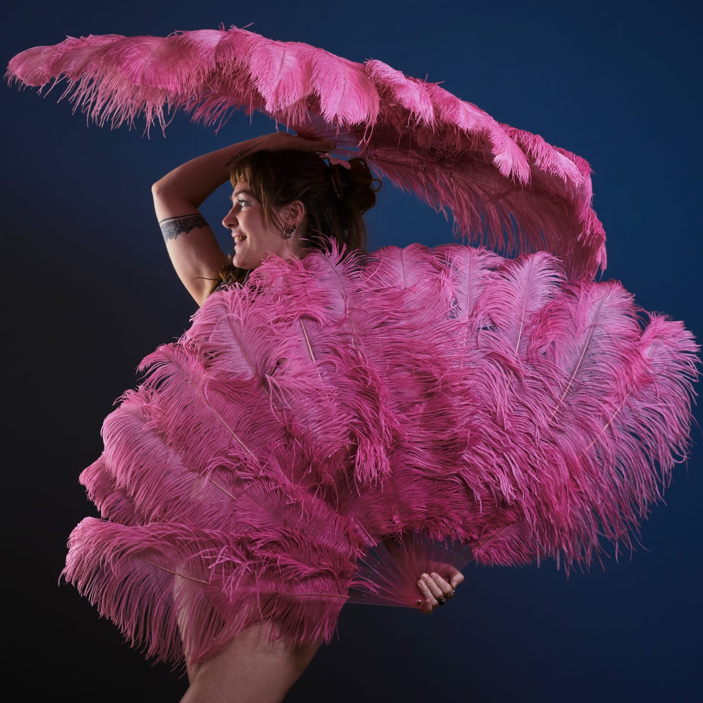 Customer photo review of Fuchsia intermediate 2 layers Ostrich Feather Fan 30"x 54"