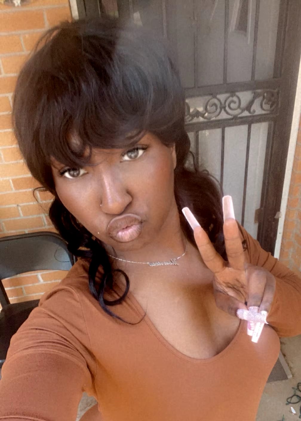 Customer photo review of Luvwin Pixie Cut Wigs Glueless Mullet Wigs With Bangs For Black Women