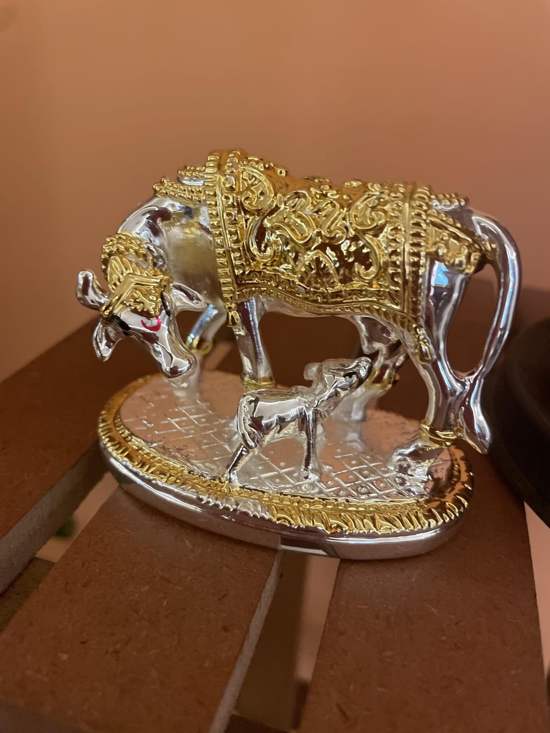Customer photo review of Kamdhenu Cow with Calf | 24K Gold & 999 Silver Plated