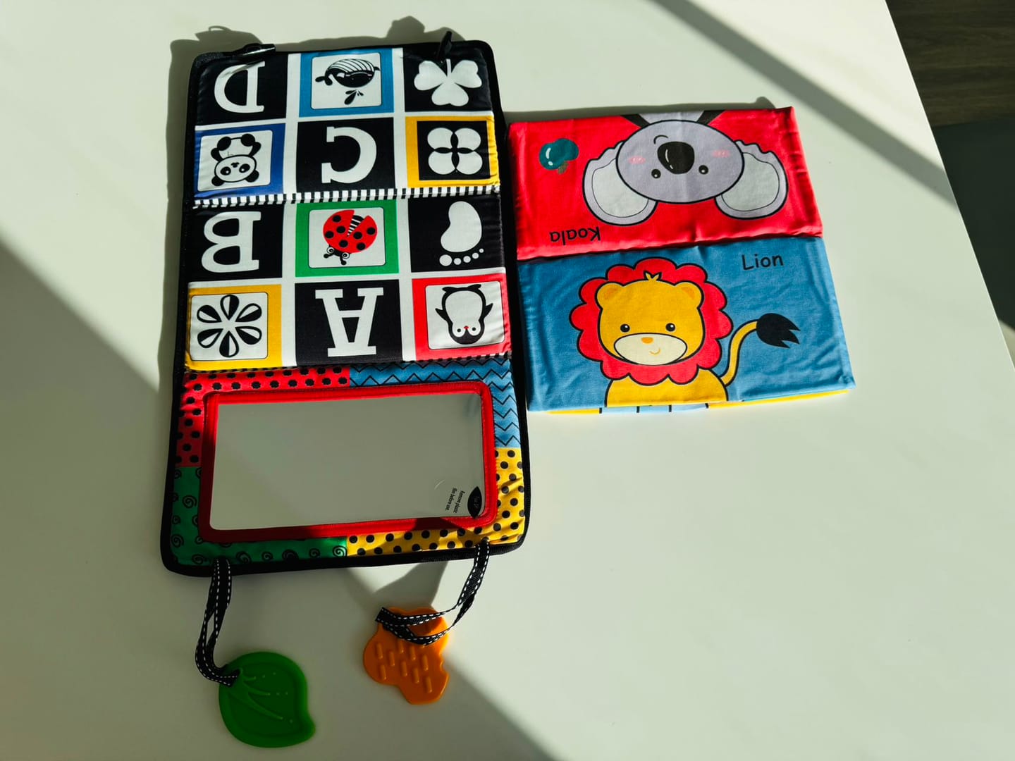 Customer photo review of Tummy Time Foldable Mirror with Interactive Sensory Book