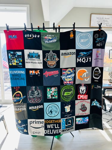 T-shirt quilt with sports, community themes by Megan from IN
