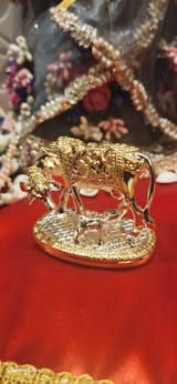 Customer photo review of Kamdhenu Cow with Calf | 24K Gold & 999 Silver Plated