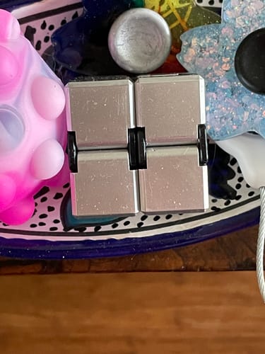 Customer photo review of Silver Infinity Cube Fidget - 108 grams